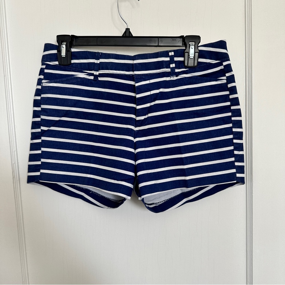 Old Navy pixie style shorts with blue and white stripes in a size 2.